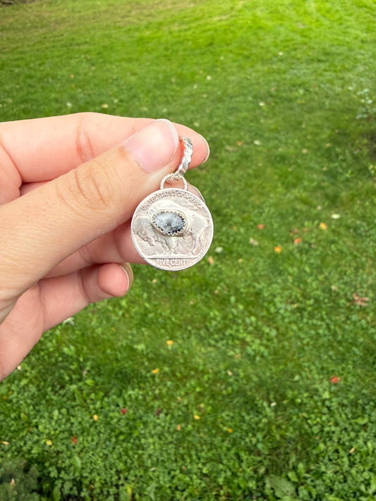 Buffalo coin pendant with white buffalo